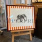 Elefant auf orangen Streifen